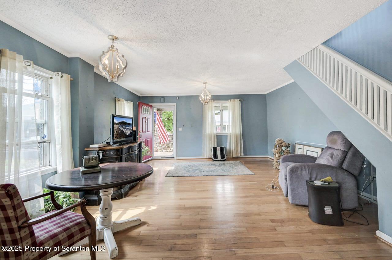 2035 Delaware Street Dunmore, PA 18512 - Photo 7 of 44 a living room with furniture and a wooden floor