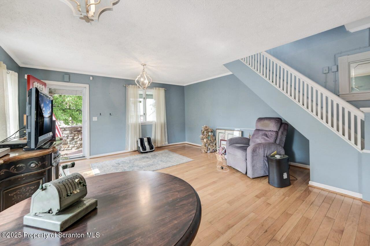 2035 Delaware Street Dunmore, PA 18512 - Photo 8 of 44 a living room with furniture and a flat screen tv