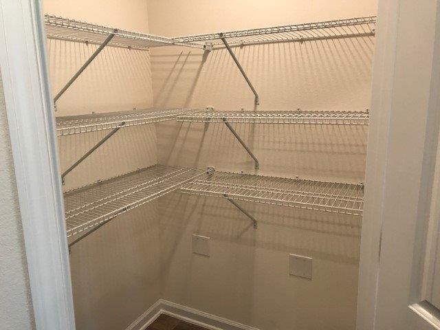 2875 Patriot Ridge Drive Crestview, FL 32539 - Photo 11 of 39 a view of a room with racks on the wall