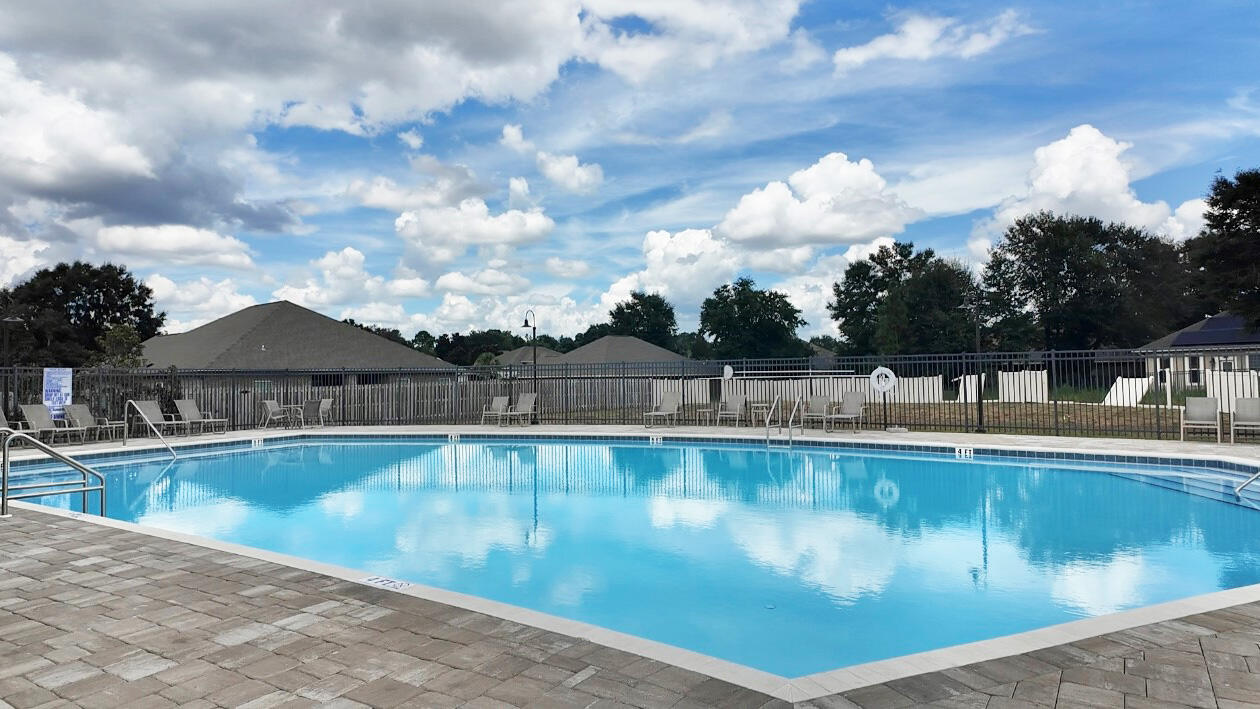 2875 Patriot Ridge Drive Crestview, FL 32539 - Photo 28 of 39 a view of a swimming pool with a lake view