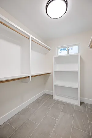 a view of an empty walk in closet