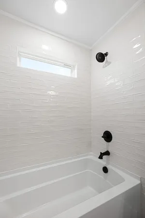 a bathroom with a bathtub