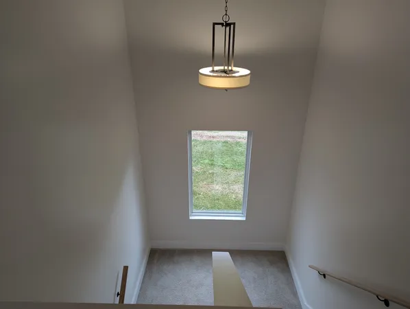 a view of a room with a window