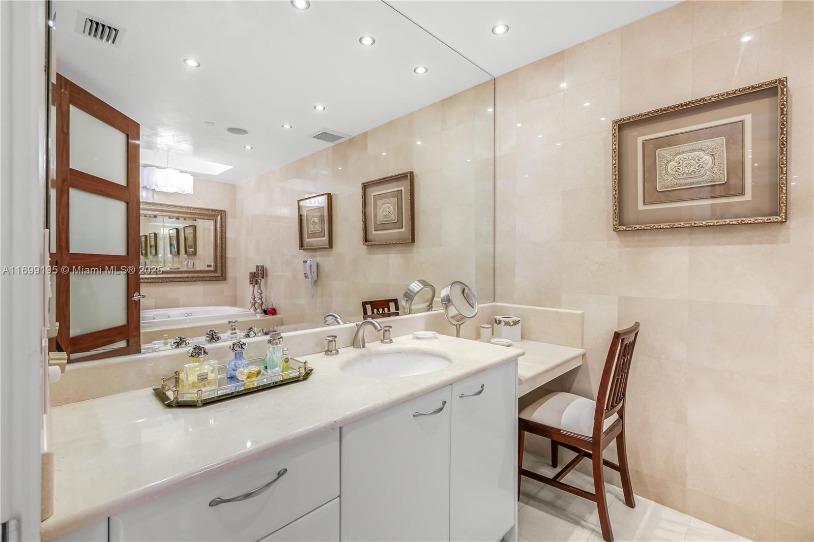 20155 Northeast 38th Court, Unit 2903 Aventura, FL 33180 - Photo 17 of 28 a view of a dining room with furniture