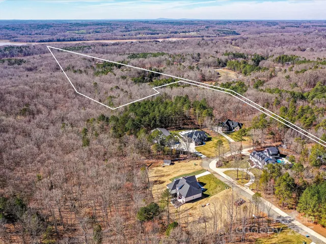 a view of a backyard with a mountain view