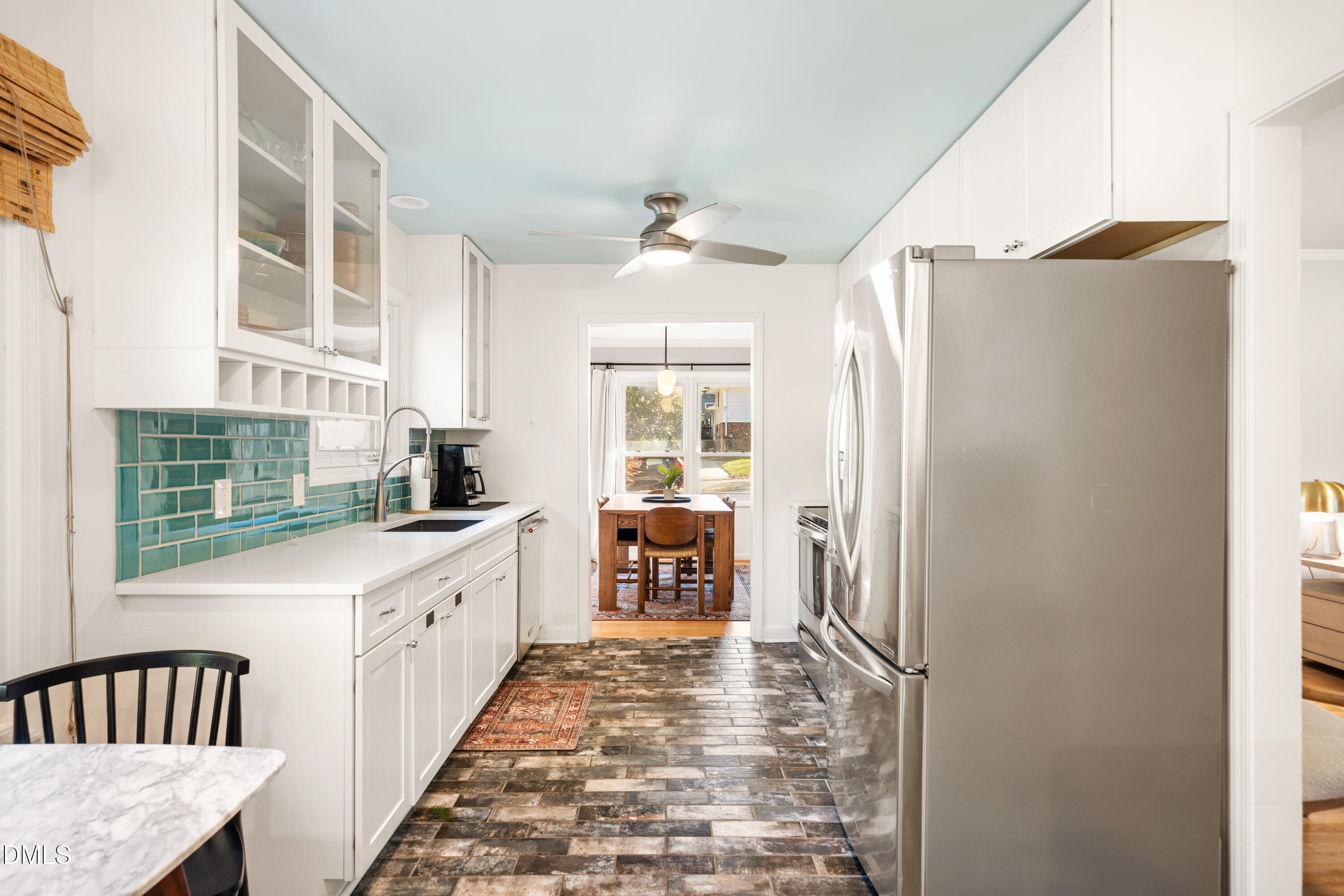 1801 Fountain Ridge Road Chapel Hill, NC 27517 - Photo 14 of 50 a kitchen with granite countertop a refrigerator and a stove top oven