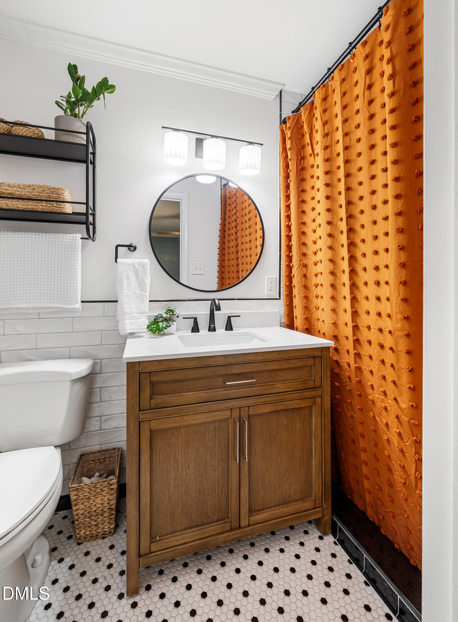 1801 Fountain Ridge Road Chapel Hill, NC 27517 - Photo 22 of 50 a bathroom with a sink toilet and mirror