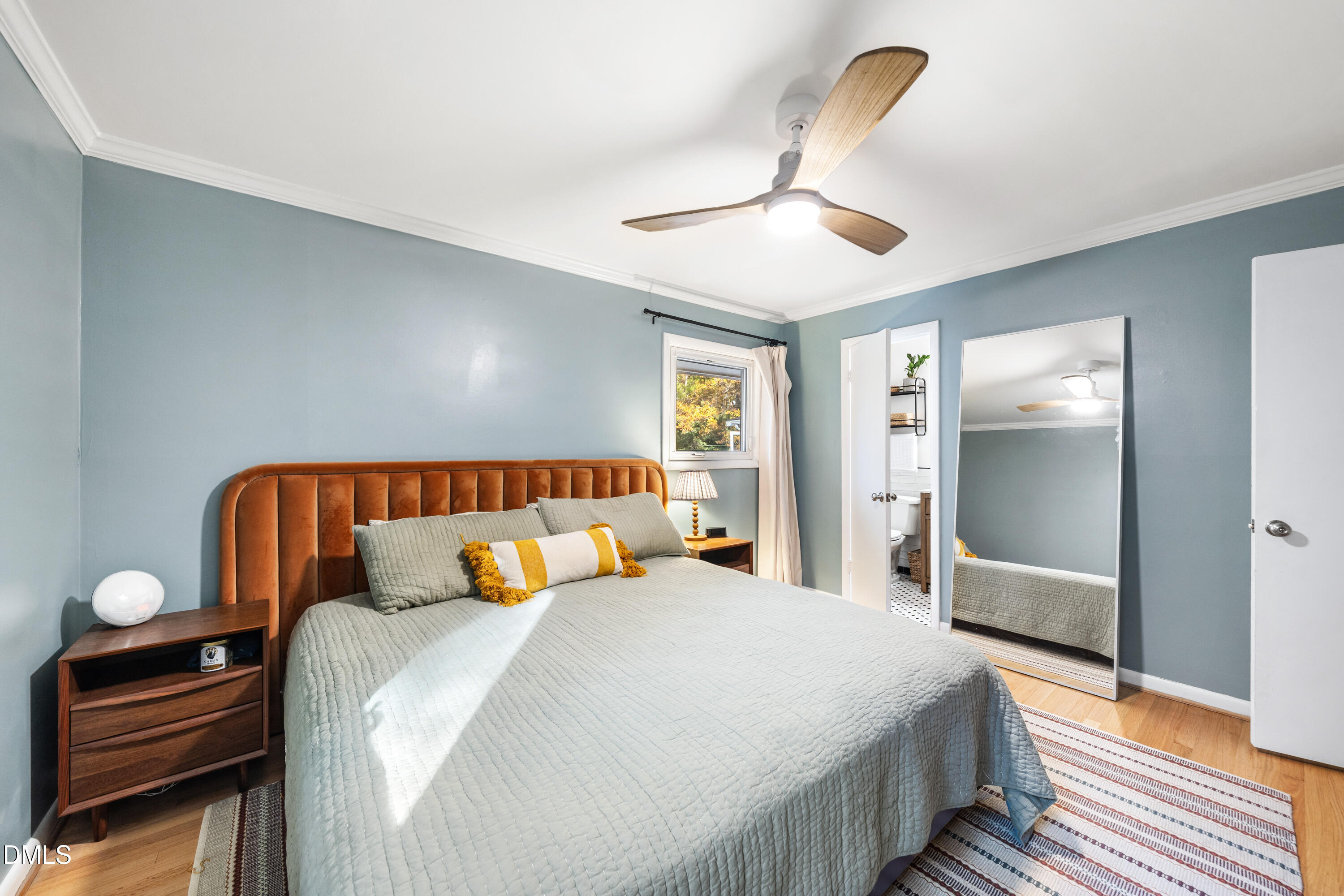 1801 Fountain Ridge Road Chapel Hill, NC 27517 - Photo 25 of 50 a bedroom with a bed and a large mirror