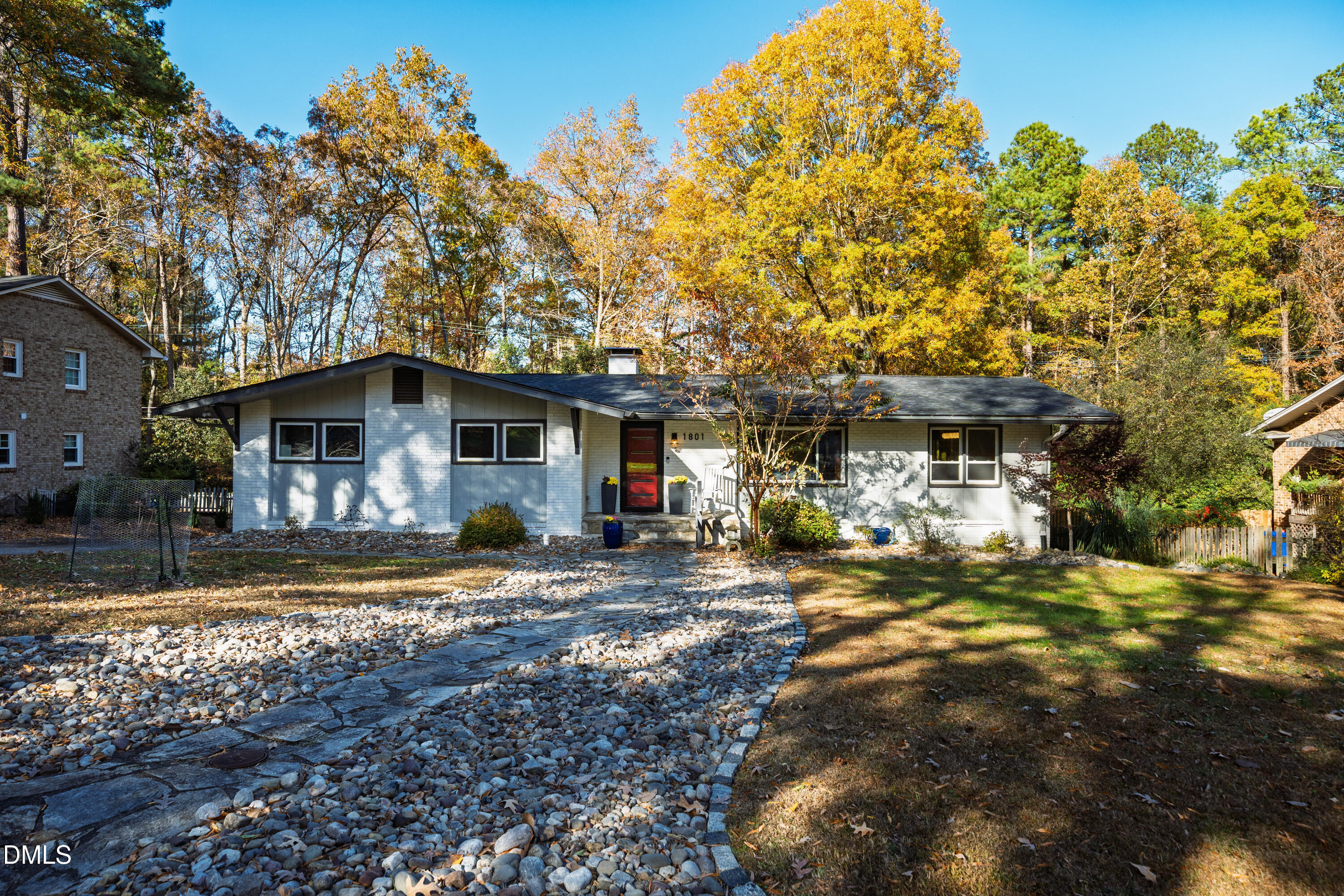 1801 Fountain Ridge Road Chapel Hill, NC 27517 - Photo 2 of 50 a view of a house with a large tree and a yard
