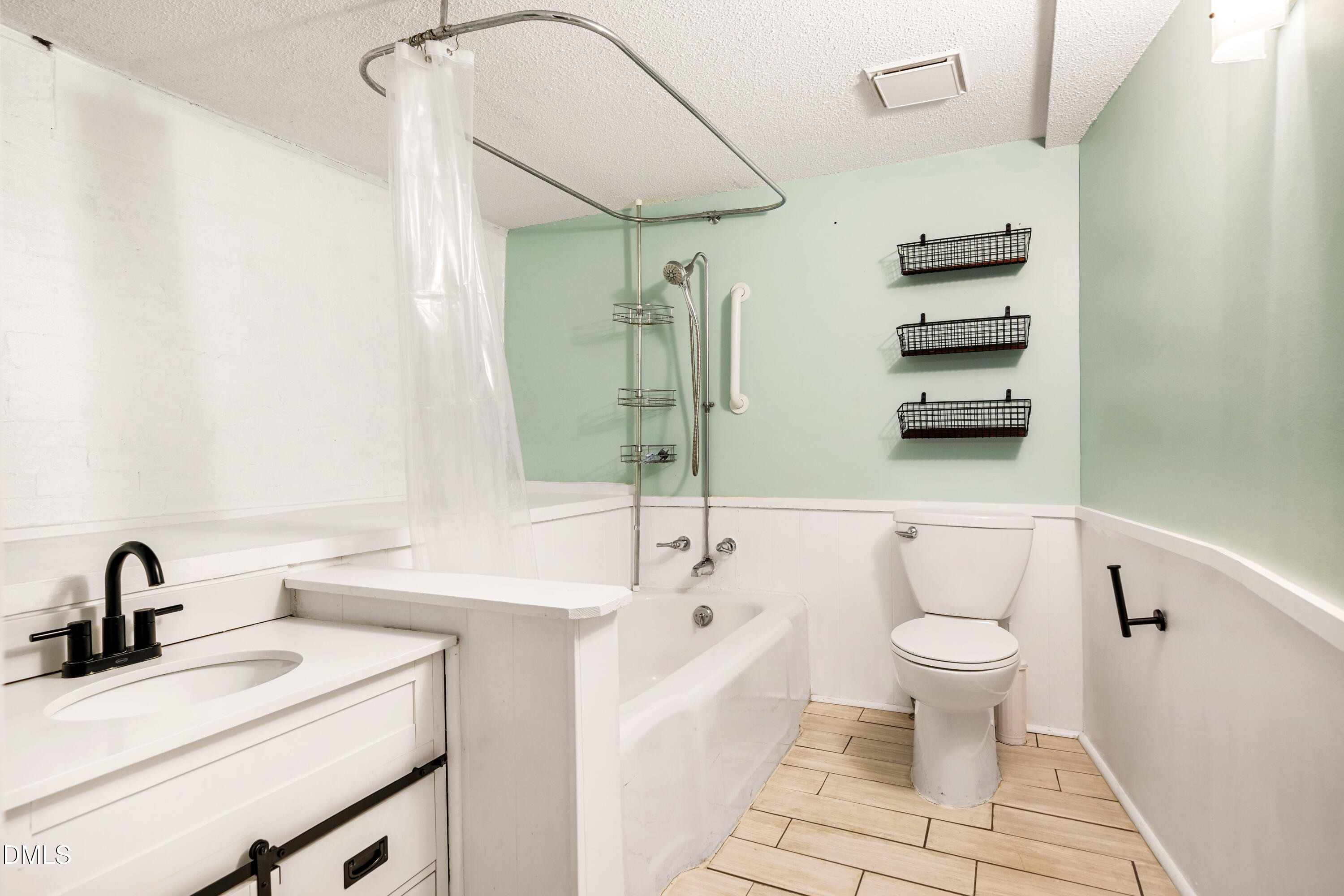 1801 Fountain Ridge Road Chapel Hill, NC 27517 - Photo 33 of 50 a bathroom with a sink toilet and shower