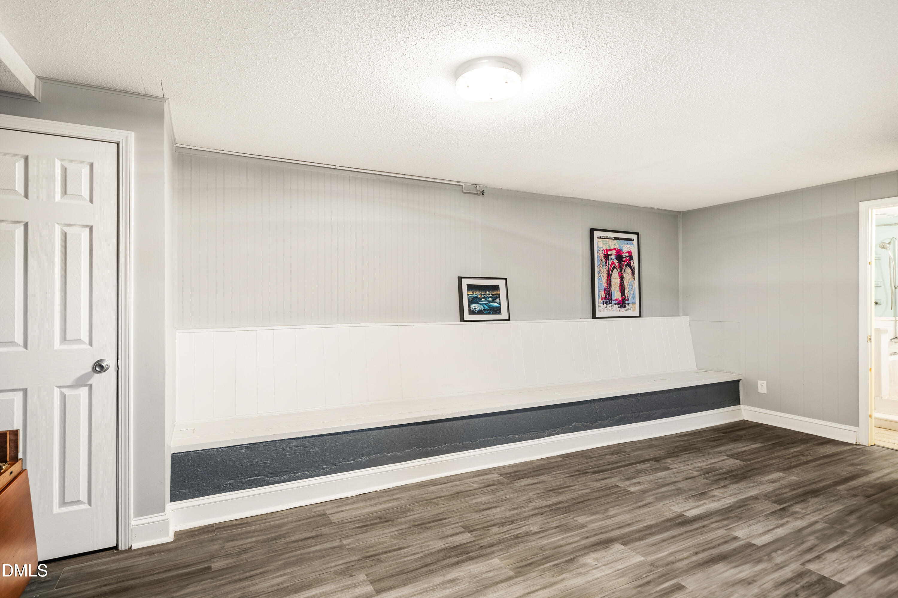 1801 Fountain Ridge Road Chapel Hill, NC 27517 - Photo 34 of 50 a view of a big room with wooden floor and windows