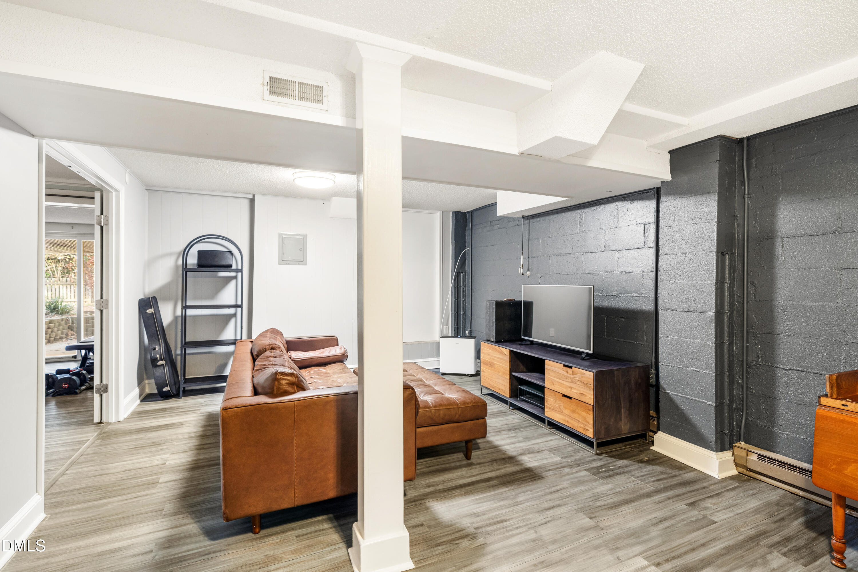 1801 Fountain Ridge Road Chapel Hill, NC 27517 - Photo 35 of 50 a living room with furniture and a fireplace