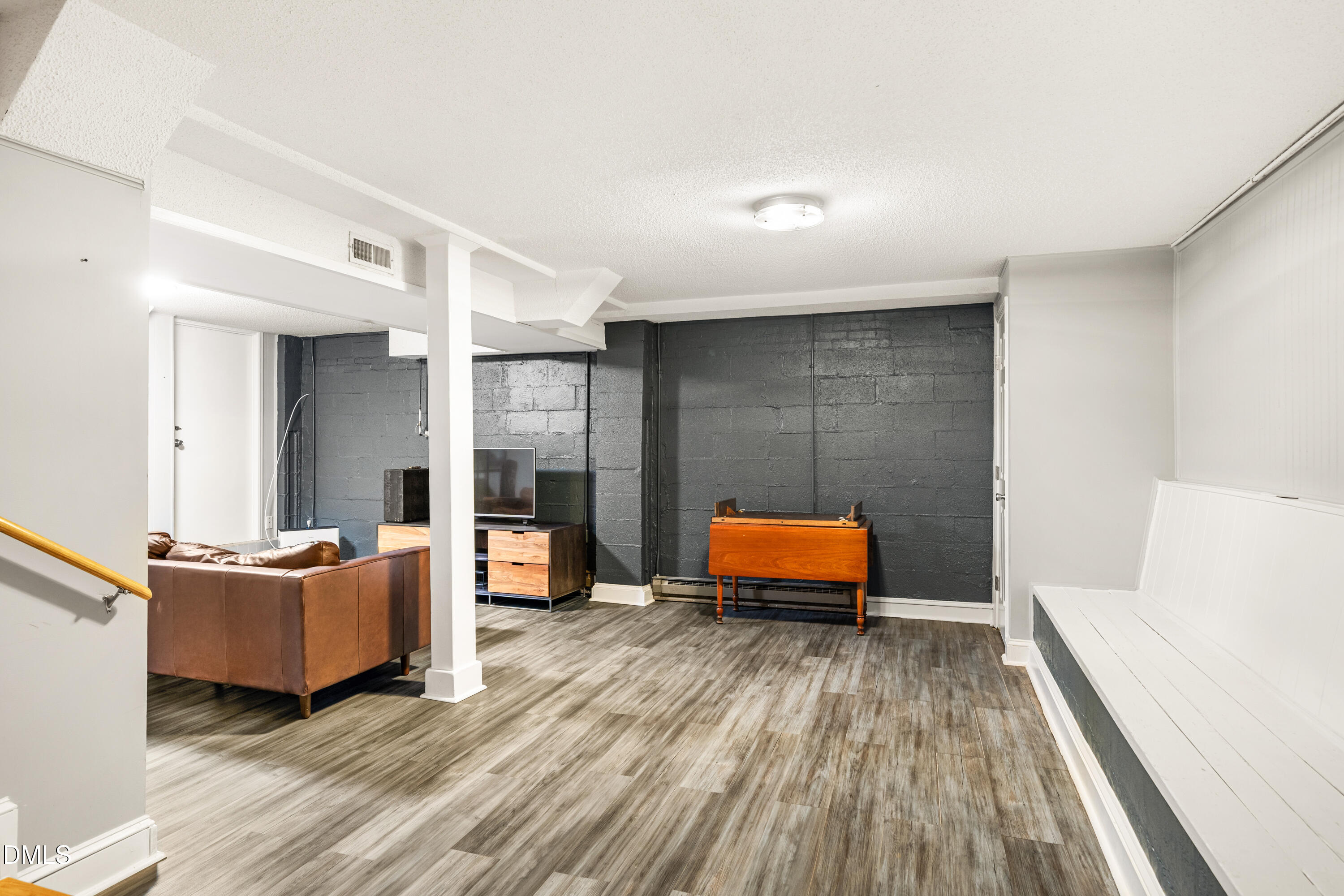 1801 Fountain Ridge Road Chapel Hill, NC 27517 - Photo 36 of 50 a living room with furniture and wooden floor