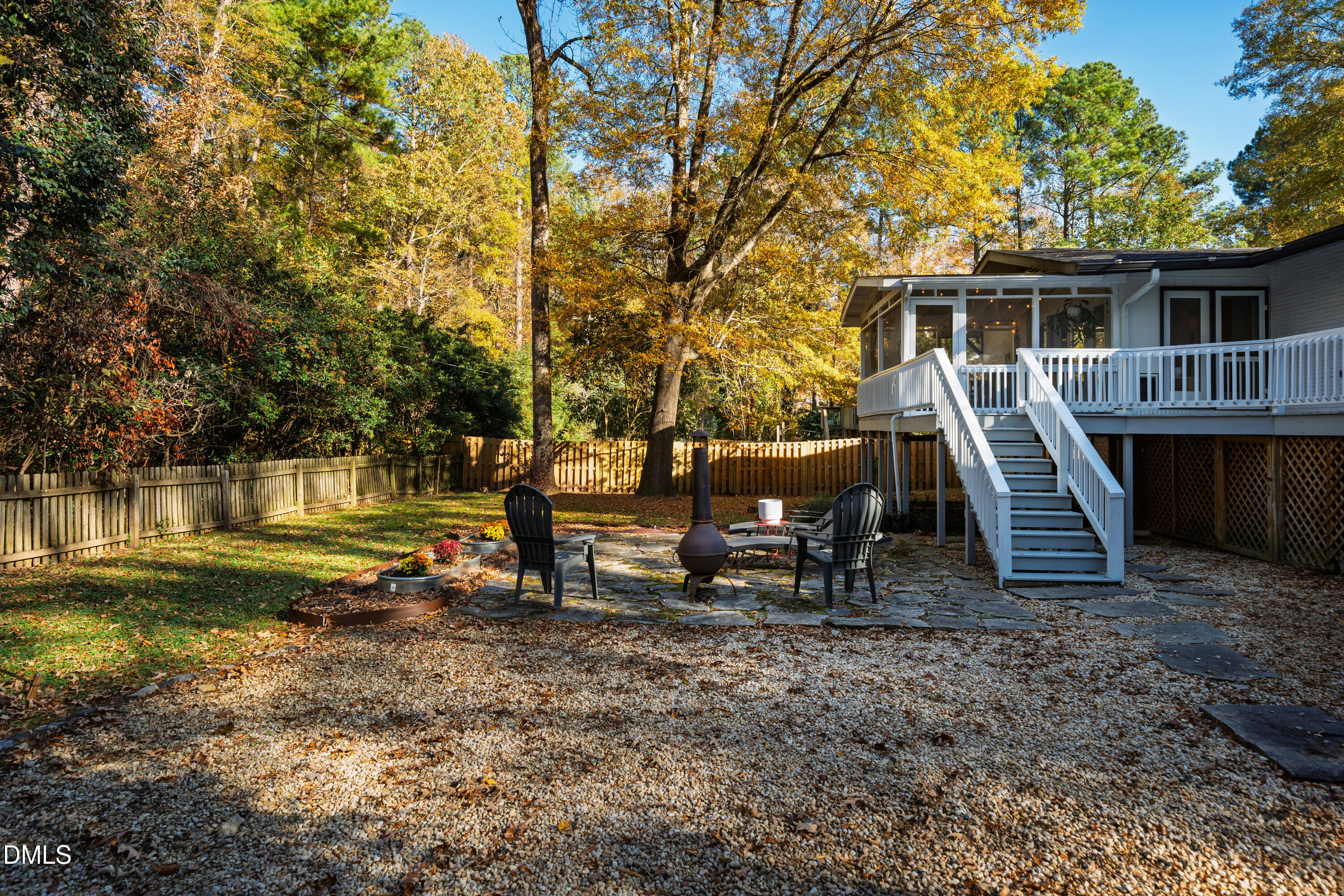 1801 Fountain Ridge Road Chapel Hill, NC 27517 - Photo 44 of 50 a view of a house with backyard and wooden fence
