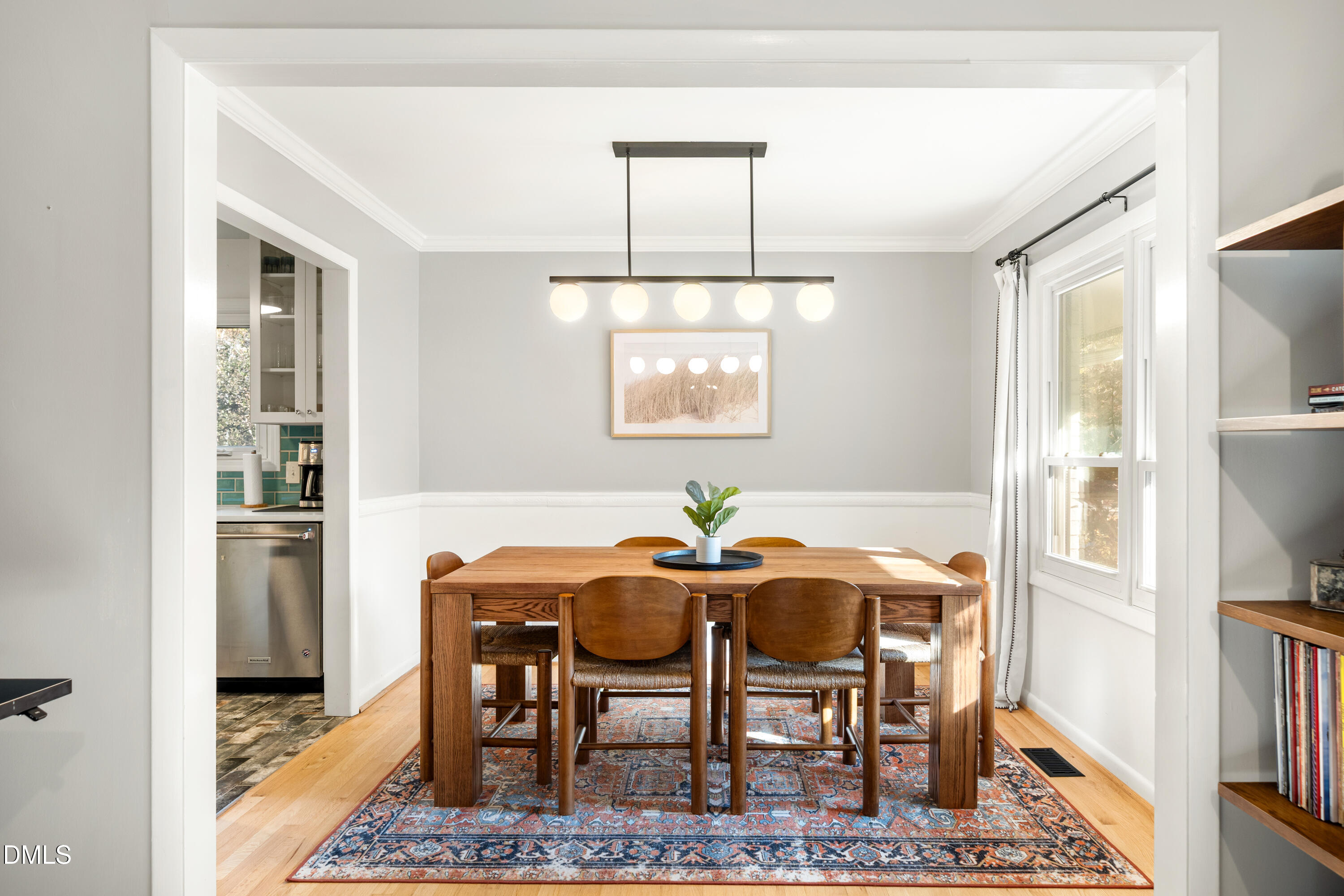 1801 Fountain Ridge Road Chapel Hill, NC 27517 - Photo 5 of 50 a view of a dining room with furniture window and wooden floor