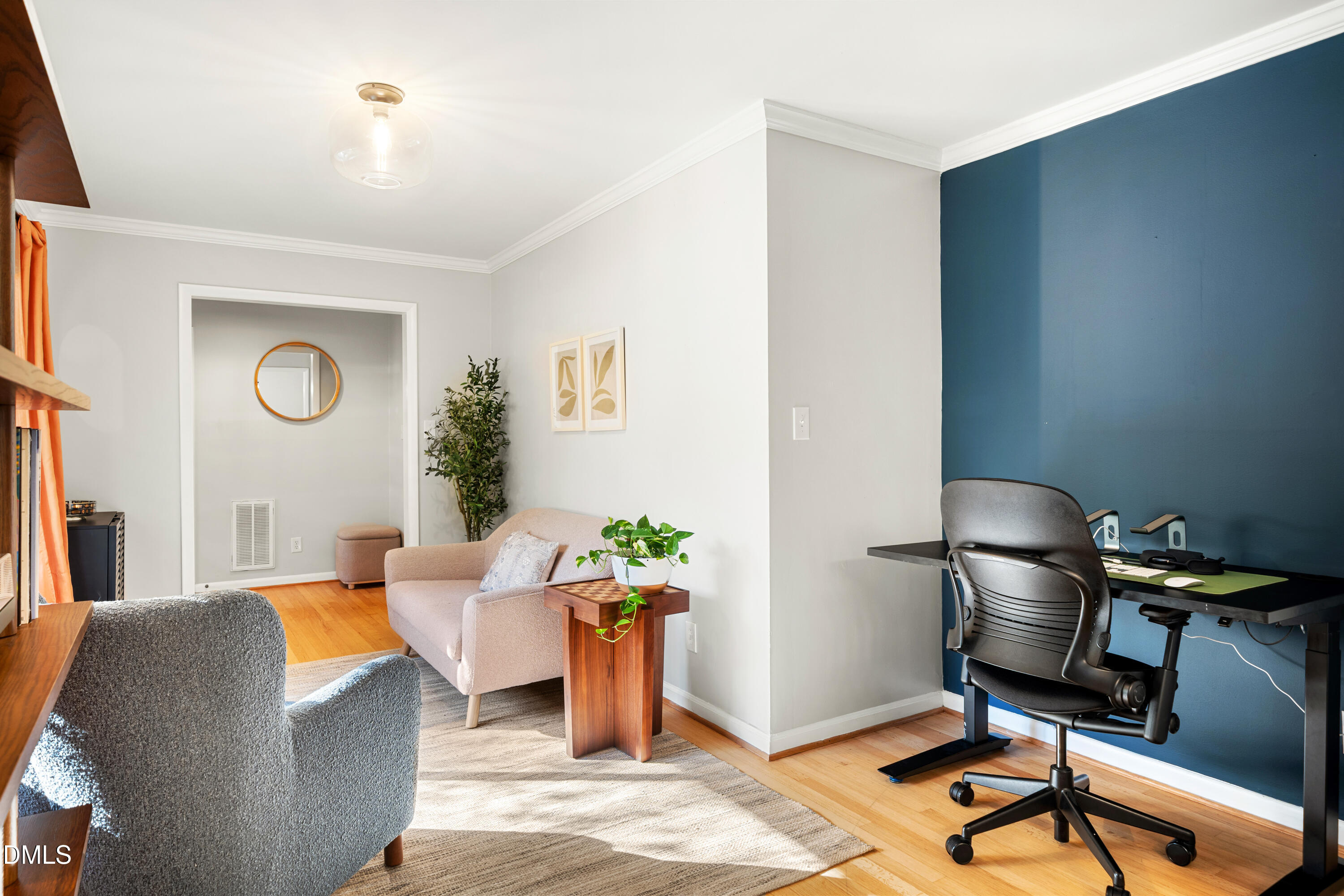 1801 Fountain Ridge Road Chapel Hill, NC 27517 - Photo 6 of 50 a living room with furniture and wooden floor