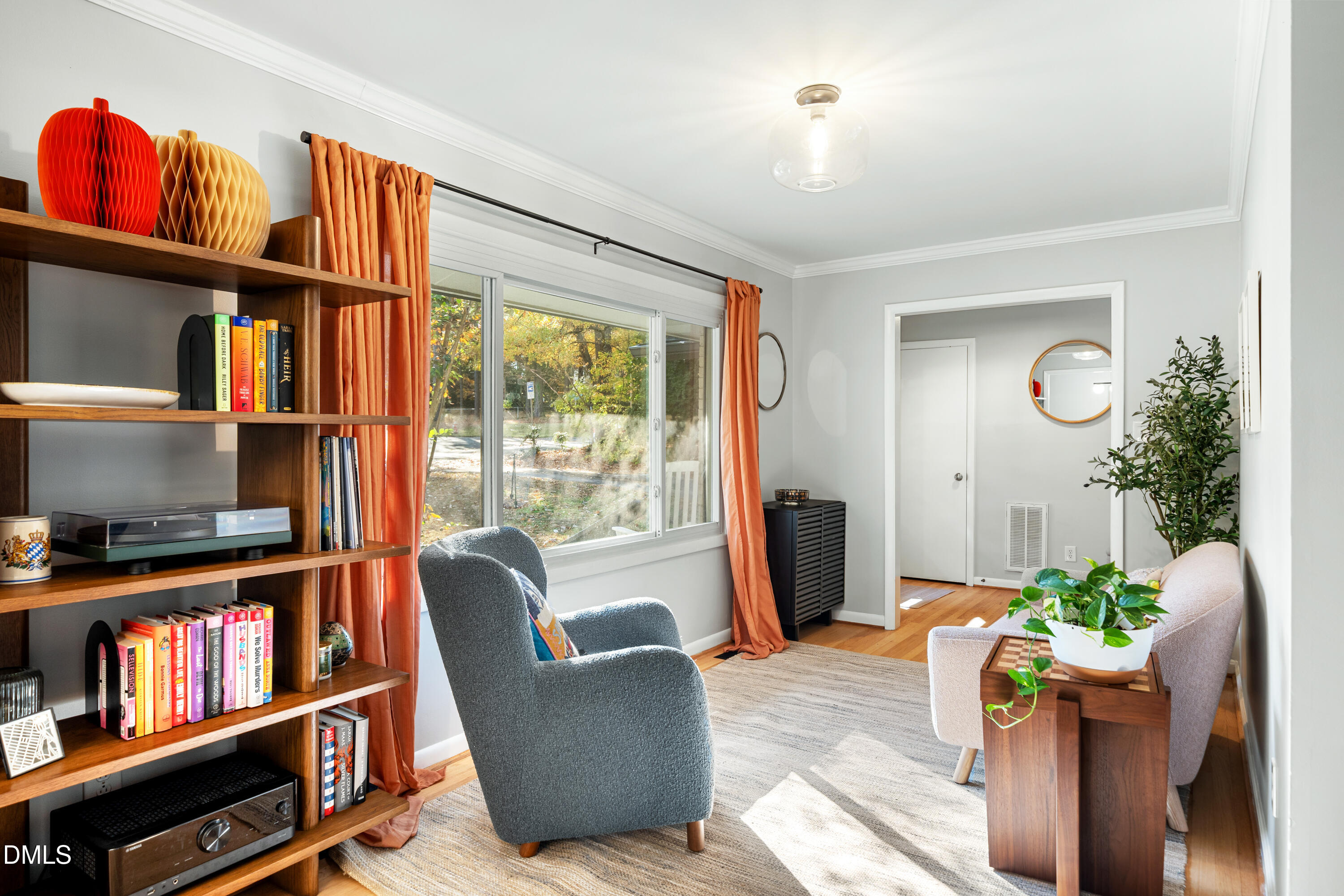 1801 Fountain Ridge Road Chapel Hill, NC 27517 - Photo 7 of 50 a living room with furniture closet and wooden floor