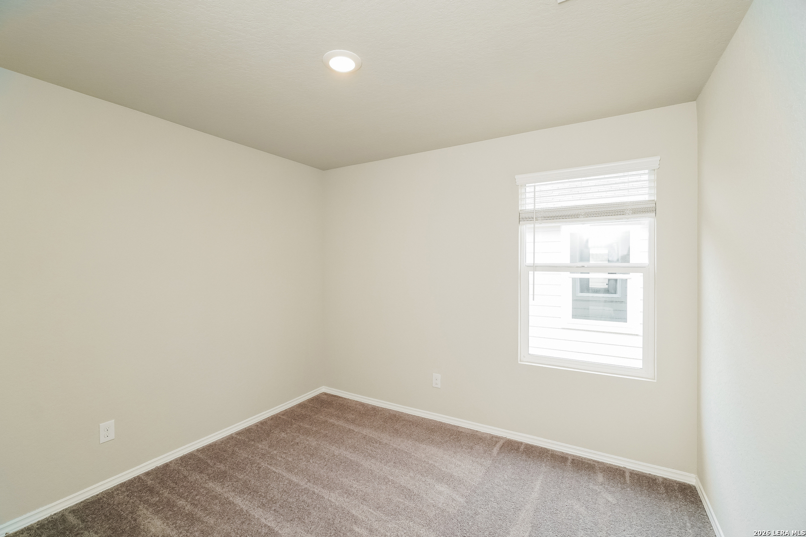 9115 Griffith Converse, TX 78109 - Photo 11 of 15 an empty room with a window