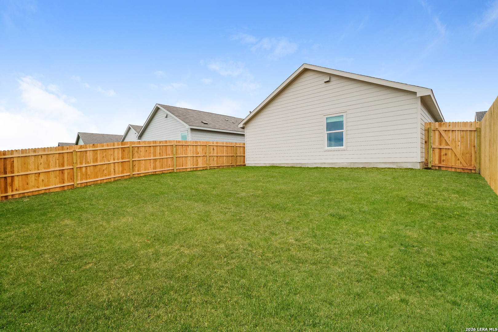 9115 Griffith Converse, TX 78109 - Photo 14 of 15 a view of a backyard of the house