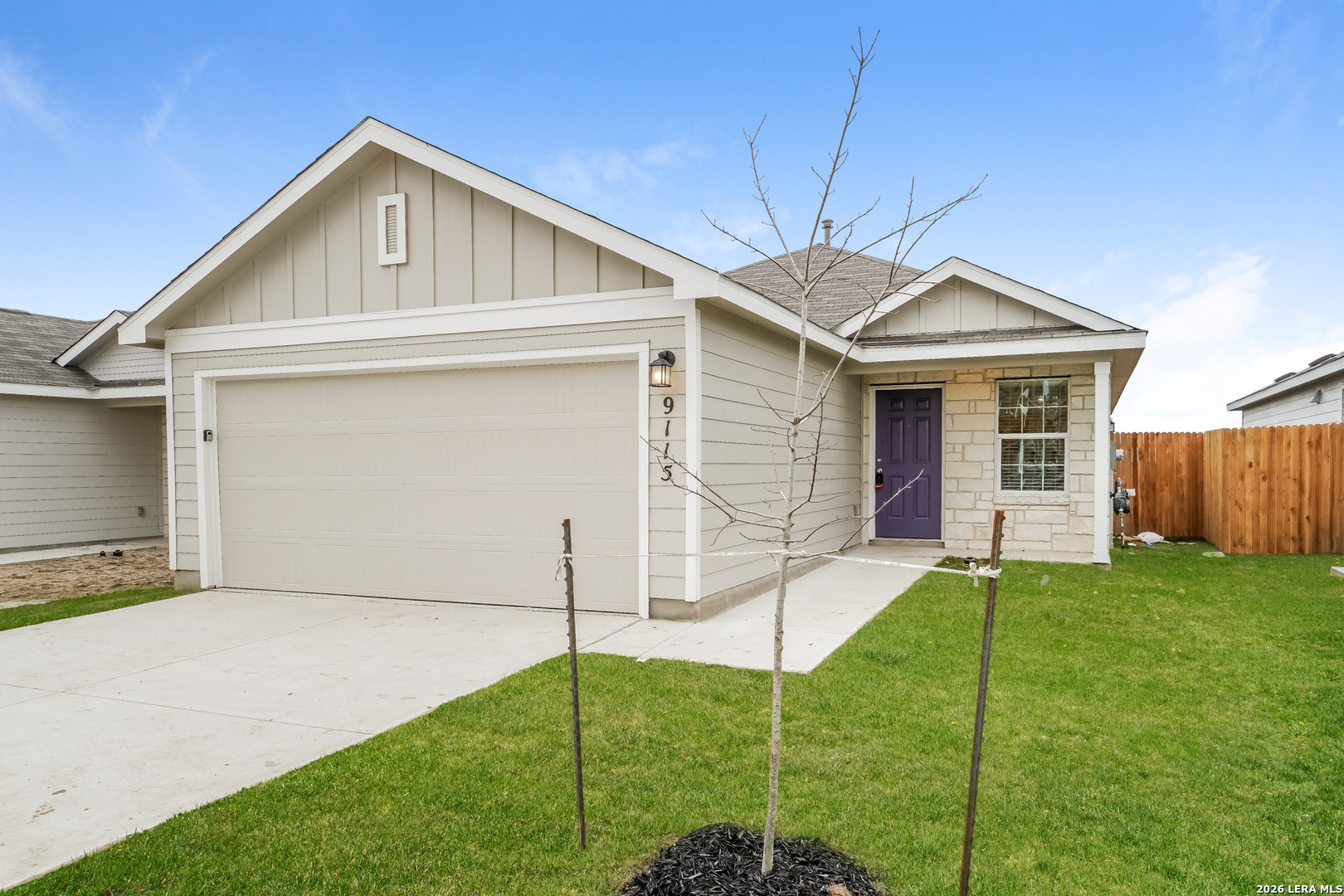 9115 Griffith Converse, TX 78109 - Photo 2 of 15 a front view of a house with plants