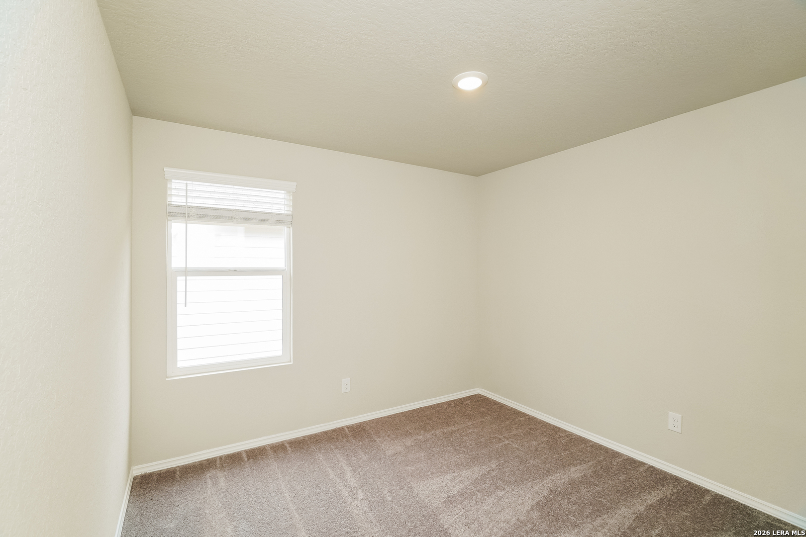 9115 Griffith Converse, TX 78109 - Photo 10 of 15 an empty room with a window