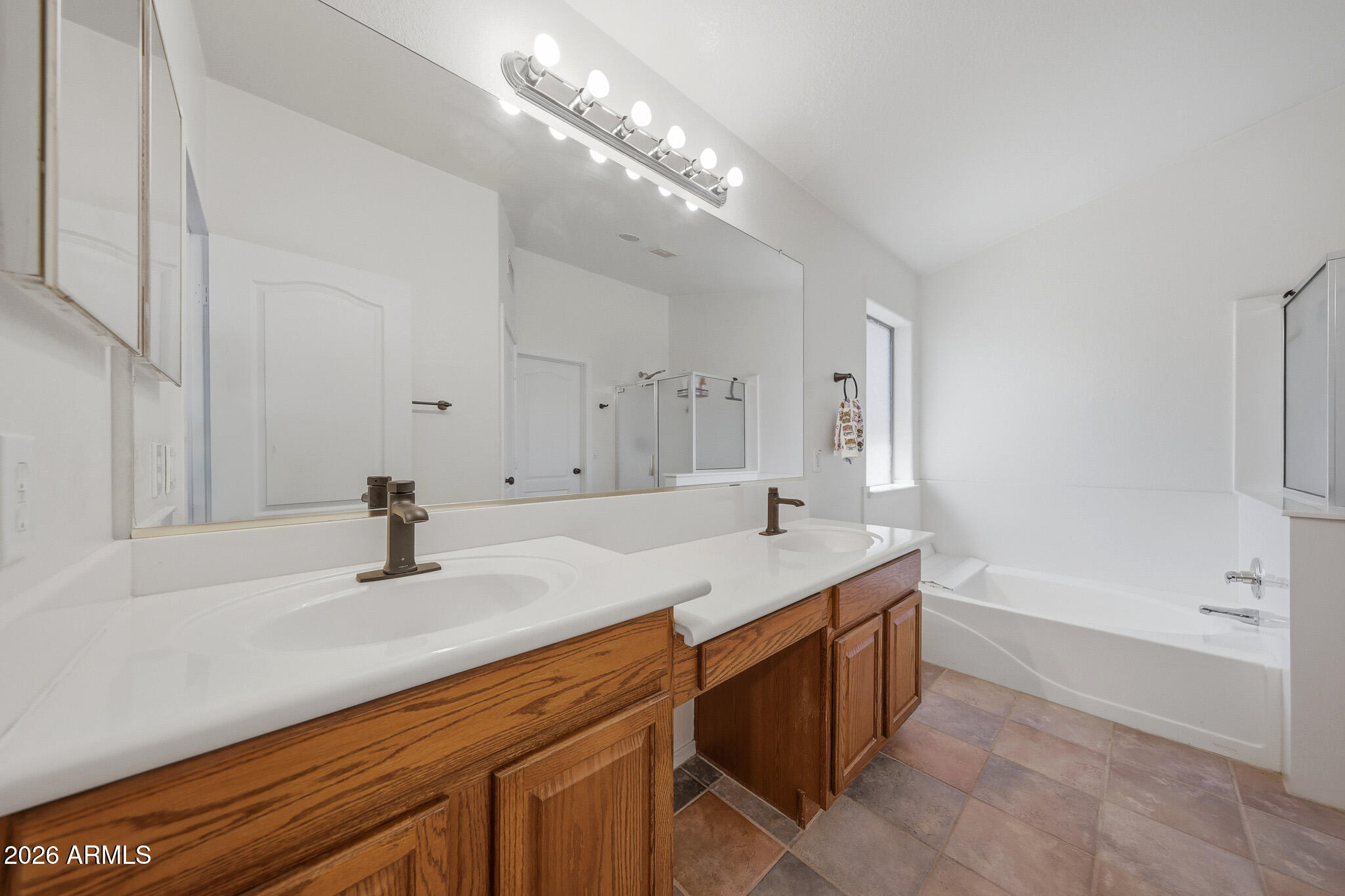 2153 East Kempton Road Chandler, AZ 85225 - Photo 20 of 50 a bathroom with a granite countertop sink and a mirror