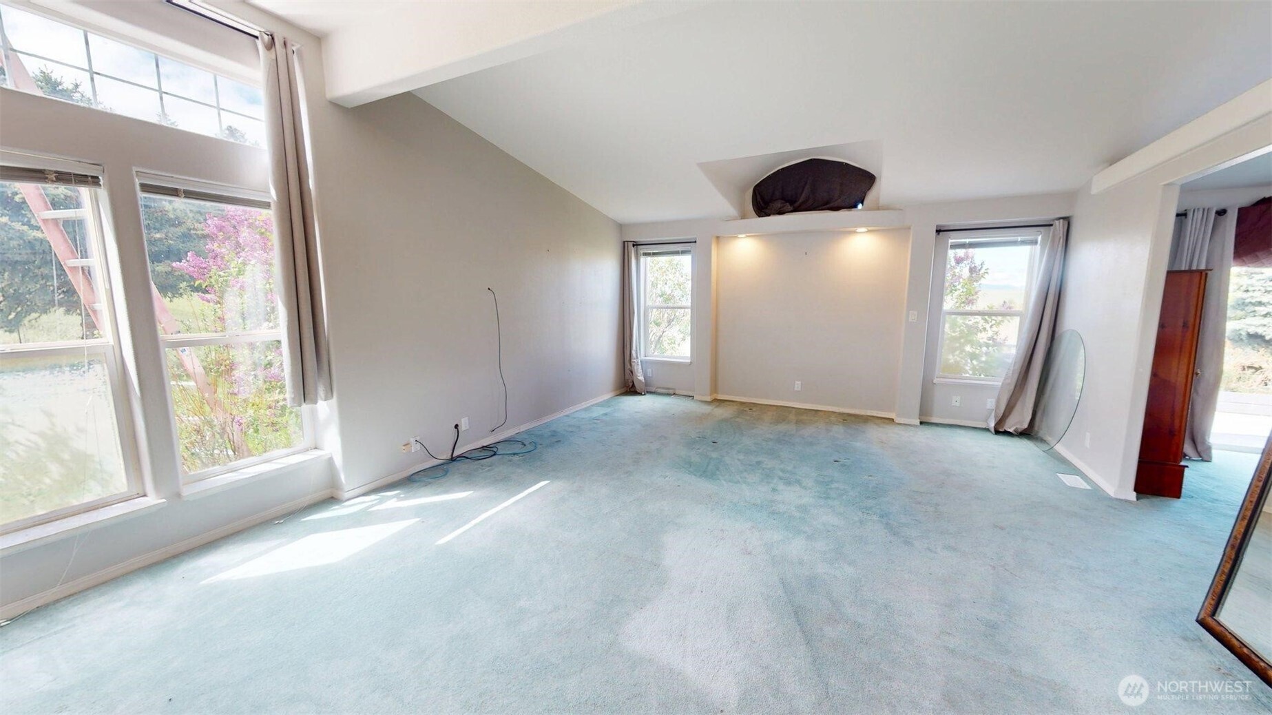 142 Fletcher Road Oroville, WA 98844 - Photo 15 of 26 an empty room with windows and closet