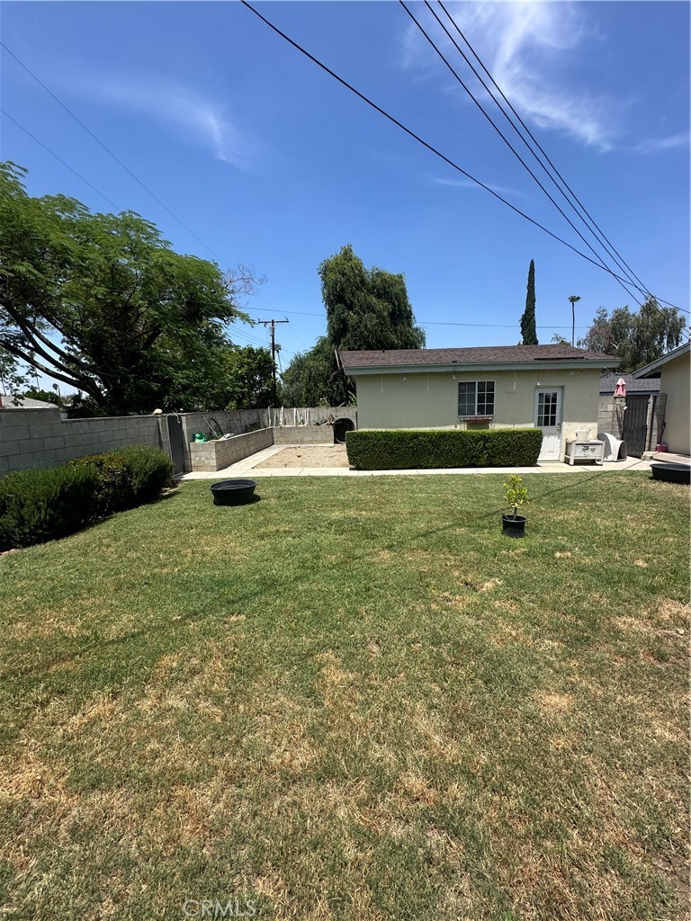 24 South Ash Street Redlands, CA 92373 - Photo 17 of 18 a view of a house with a yard