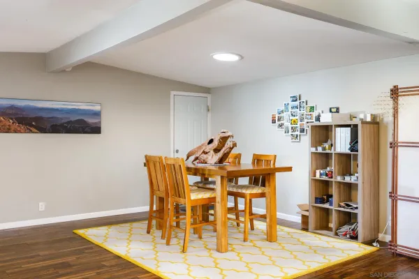 a view of a dining room with furniture