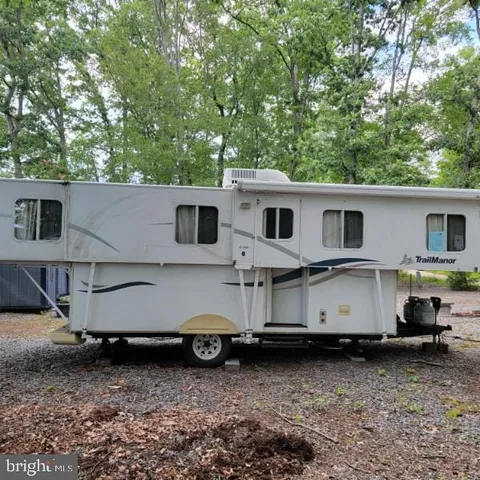 a house view with a backyard space