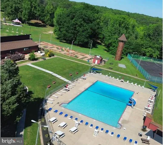 a view of a play ground with an outdoor space