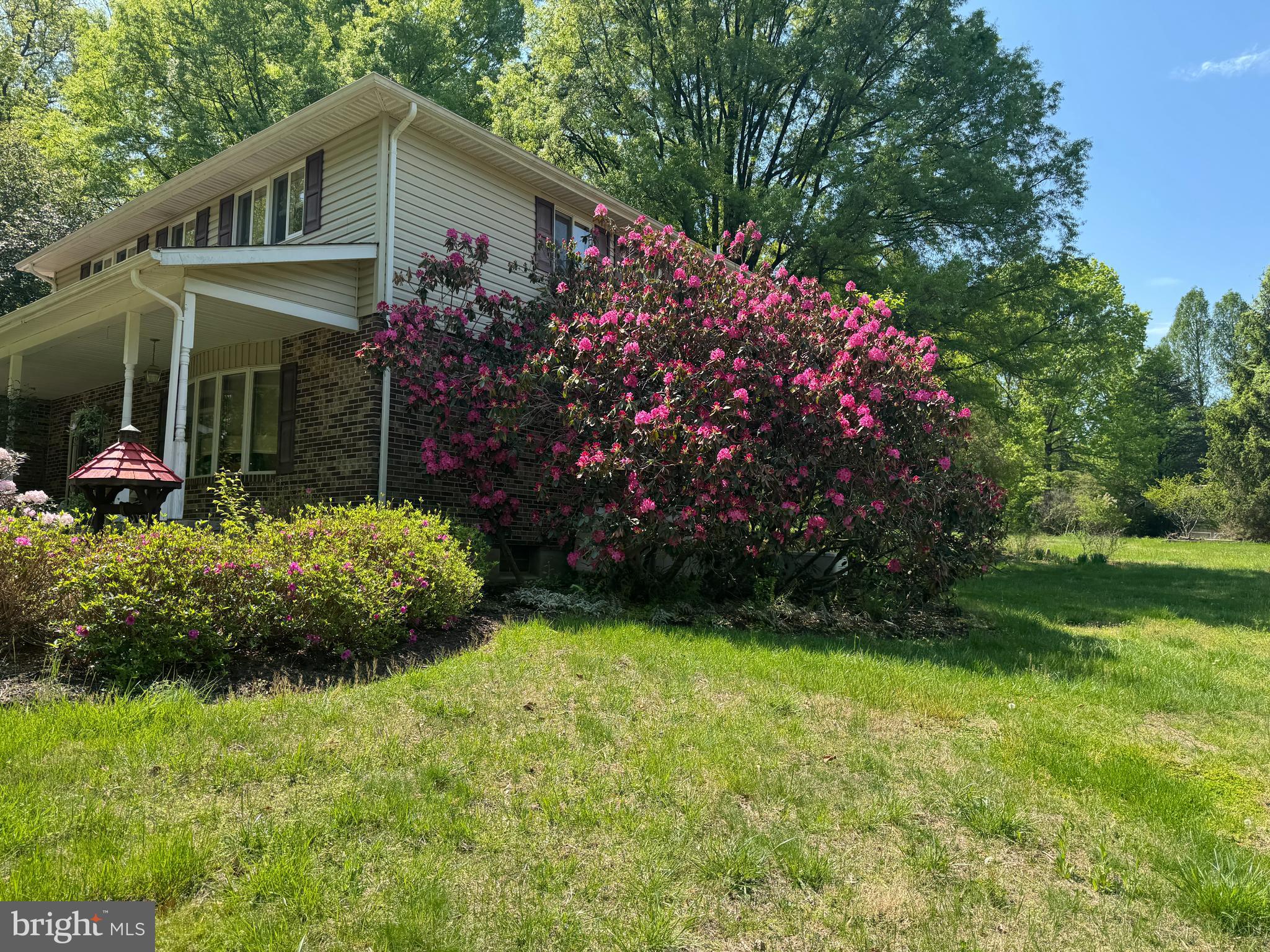 6008 Fork Woods Road Baldwin, MD 21013 - Photo 5 of 12 a front view of a house with a garden