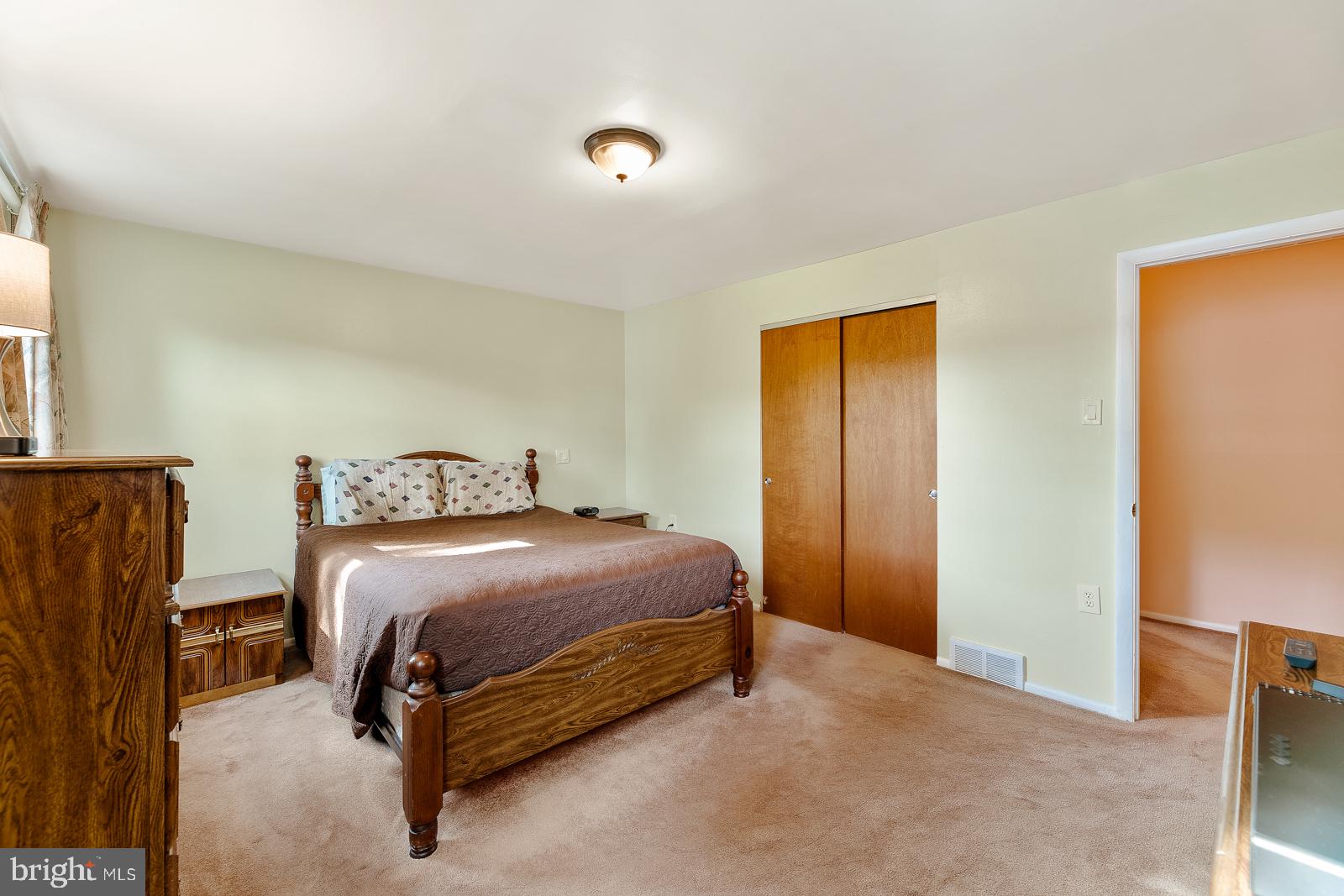 823 Rennard Street Philadelphia, PA 19116 - Photo 20 of 40 Cozy bedroom with warm, inviting tones.