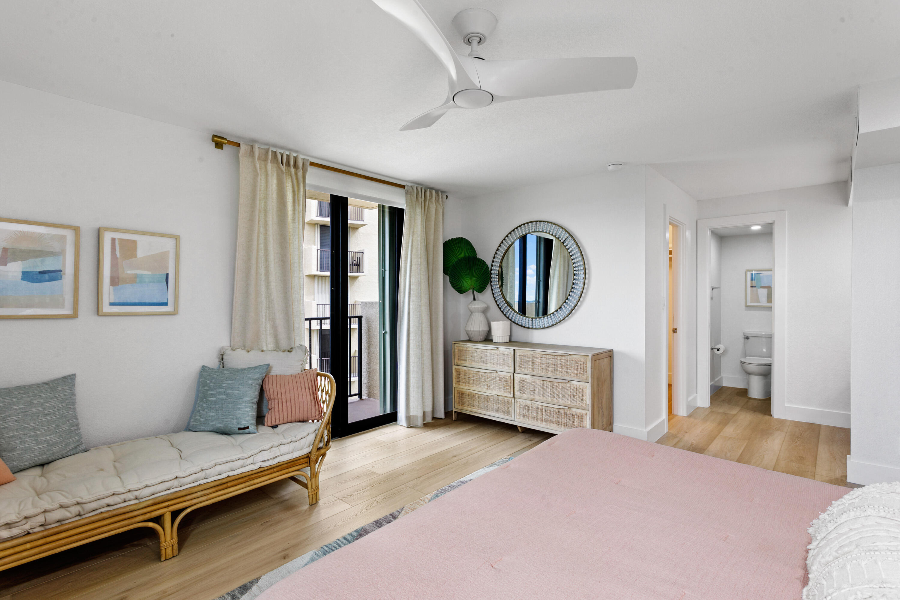 100 Ocean Trail Way, Unit 910 Jupiter, FL 33477 - Photo 13 of 30 a bedroom with furniture and a dresser