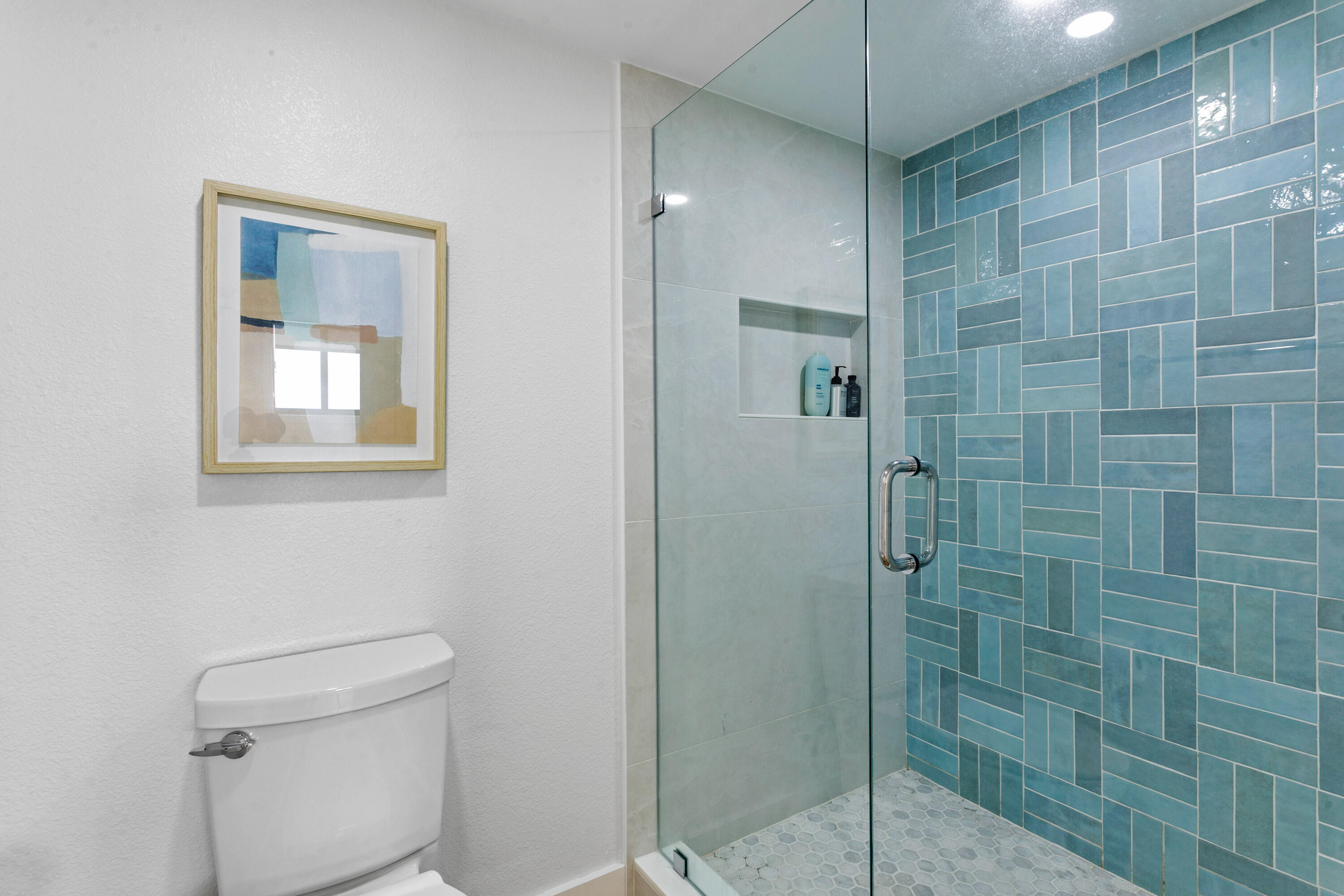 100 Ocean Trail Way, Unit 910 Jupiter, FL 33477 - Photo 15 of 30 a bathroom with a shower and a toilet