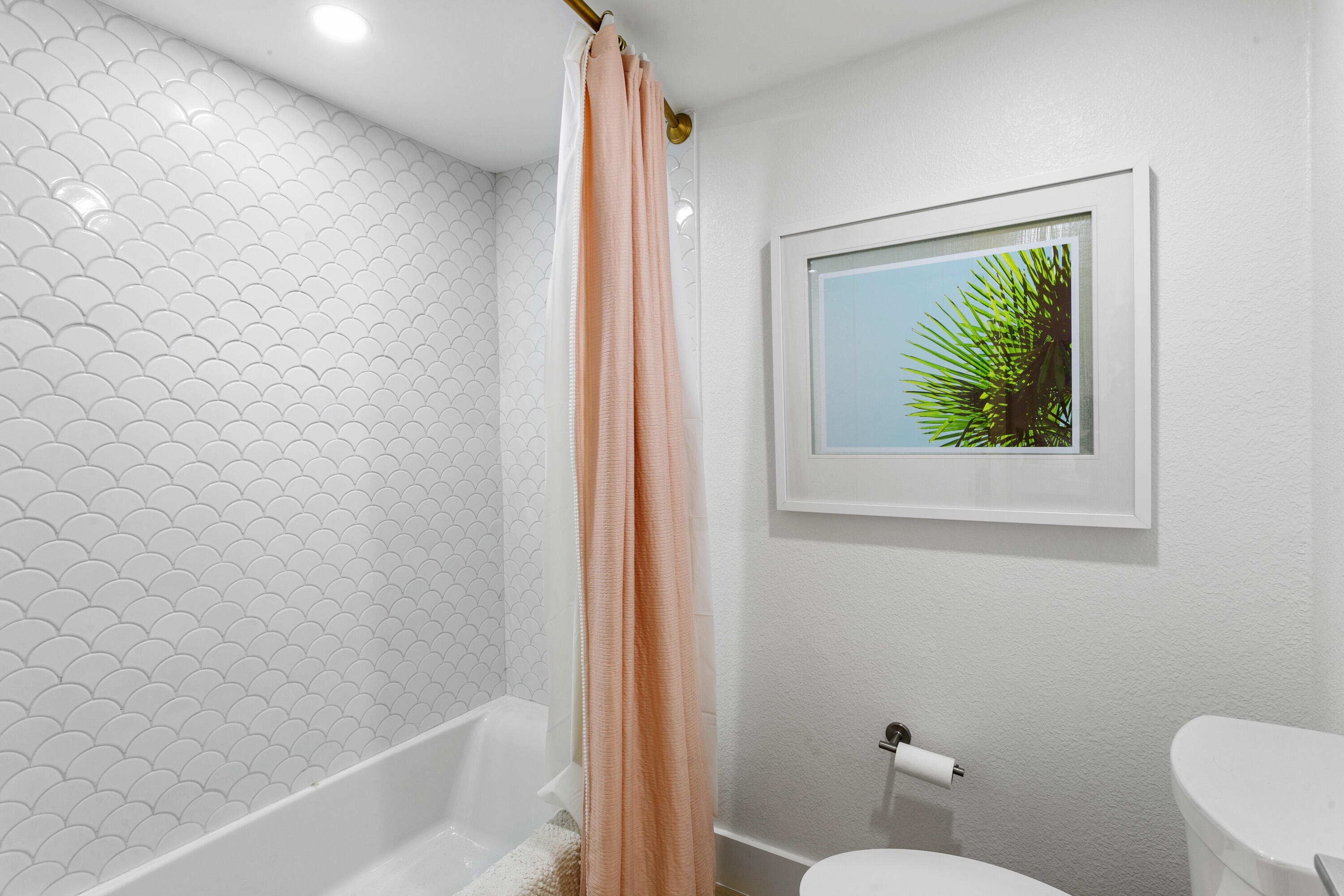 100 Ocean Trail Way, Unit 910 Jupiter, FL 33477 - Photo 19 of 30 a bathroom with a toilet and a shower