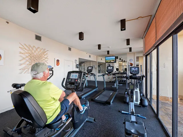 a view of a house with a flower garden