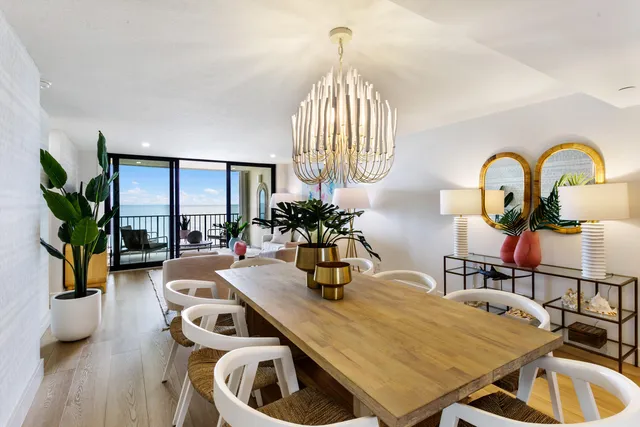 a kitchen with a table and chairs