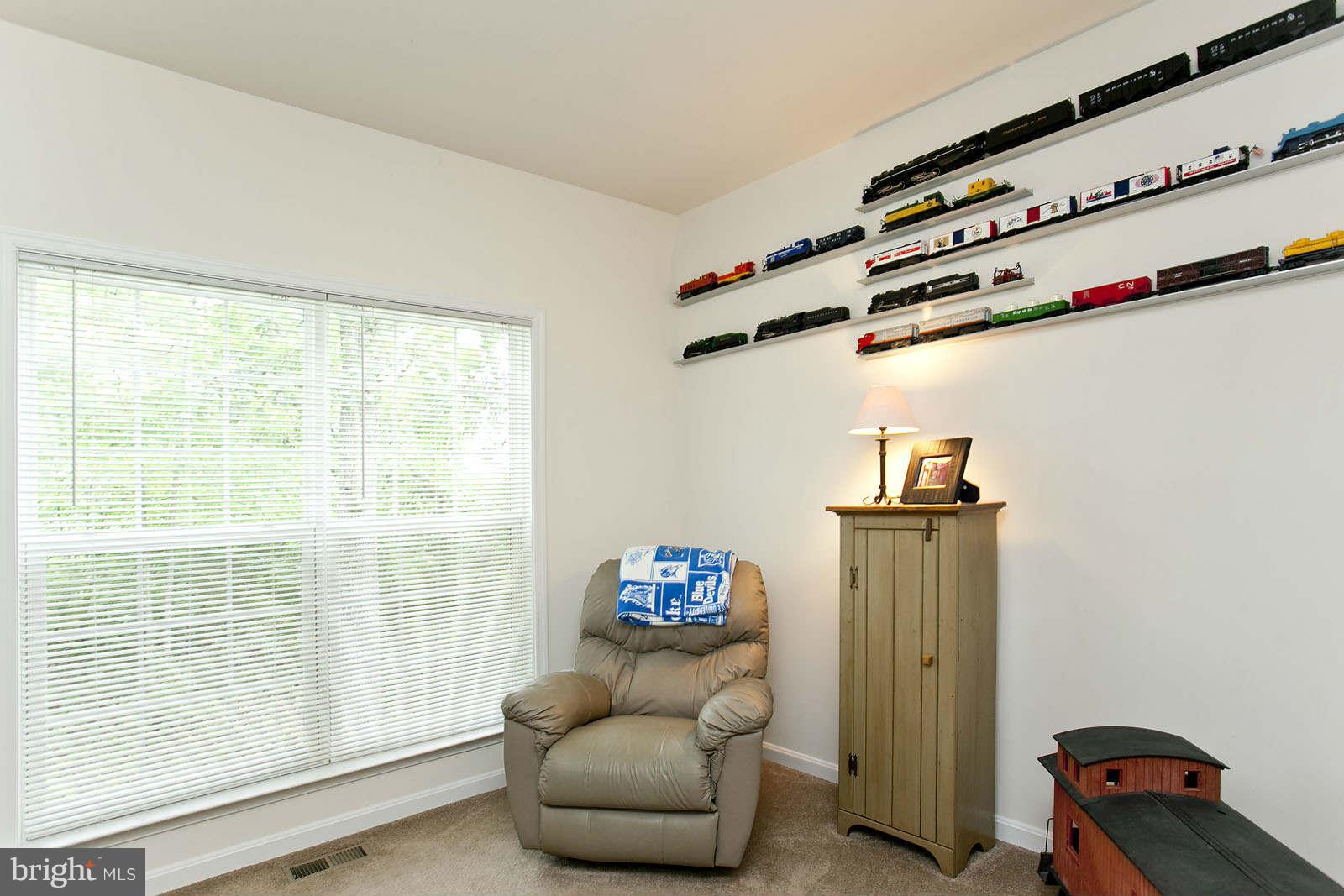 131 Holiday Road Cross Junction, VA 22625 - Photo 14 of 30 a living room with furniture and a window