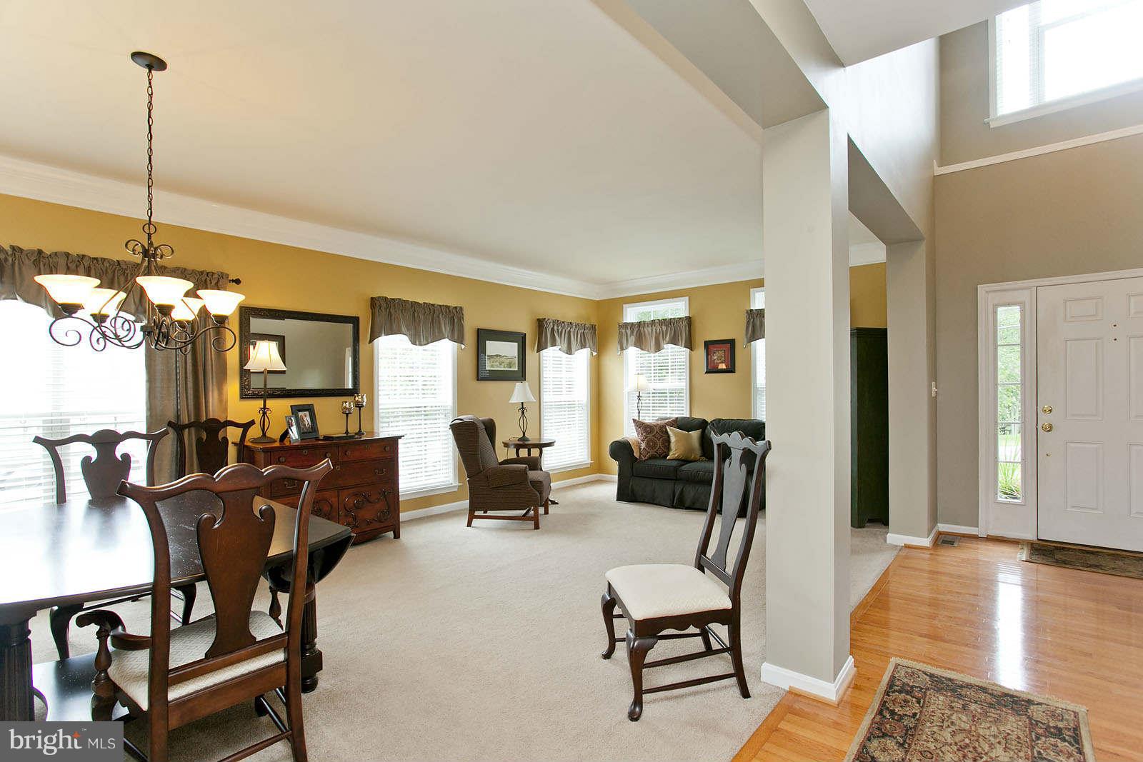 131 Holiday Road Cross Junction, VA 22625 - Photo 6 of 30 a view of a livingroom with furniture and windows