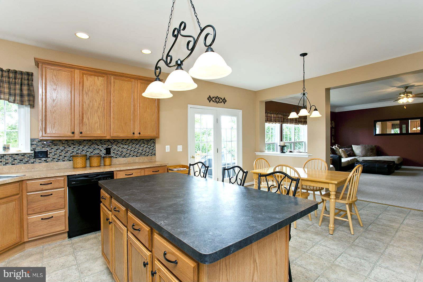 131 Holiday Road Cross Junction, VA 22625 - Photo 10 of 30 a dining table with chairs and window