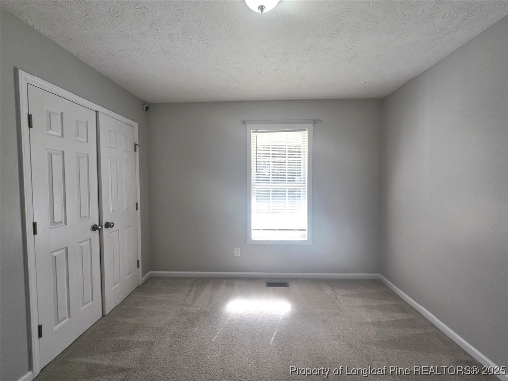 2486 O'Hara Drive Raeford, NC 28376 - Photo 23 of 28 an empty room with a window