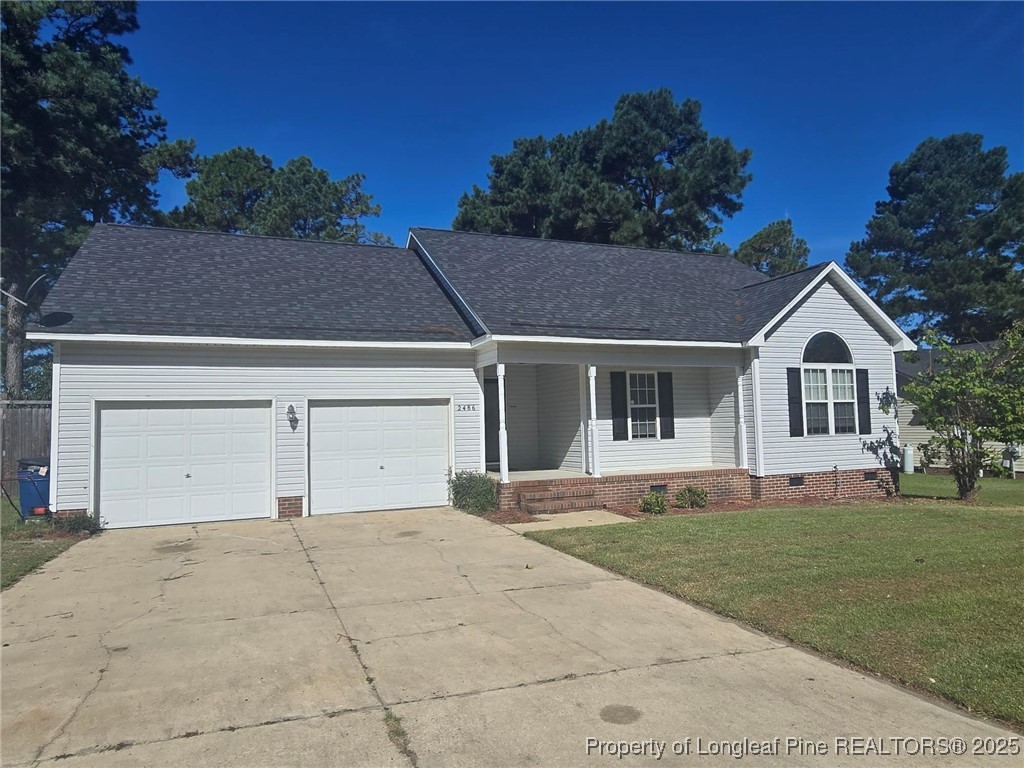 2486 O'Hara Drive Raeford, NC 28376 - Photo 3 of 28 a view of a white house with a yard