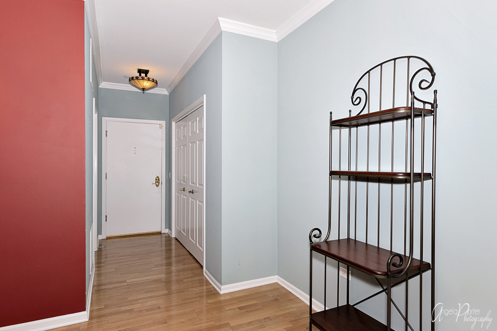 640 McHenry Road, Unit 108 Wheeling, IL 60090 - Photo 2 of 30 a view of entryway with wooden floor