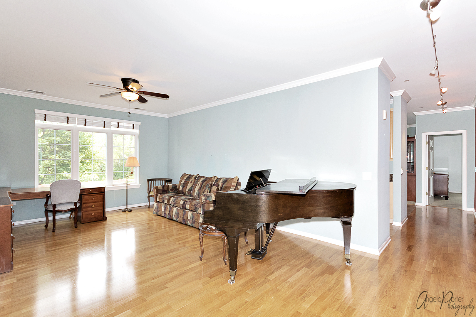 640 McHenry Road, Unit 108 Wheeling, IL 60090 - Photo 3 of 30 a living room with furniture and wooden floor