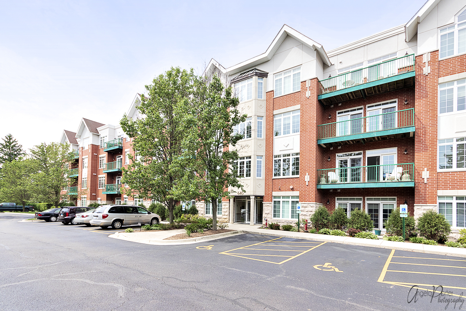 640 McHenry Road, Unit 108 Wheeling, IL 60090 - Photo 27 of 30 a view of a building with a street