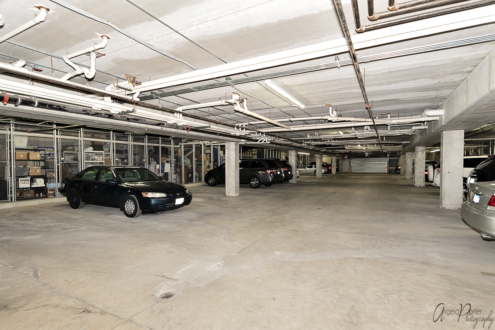 640 McHenry Road, Unit 108 Wheeling, IL 60090 - Photo 28 of 30 a view of parking garage with furniture