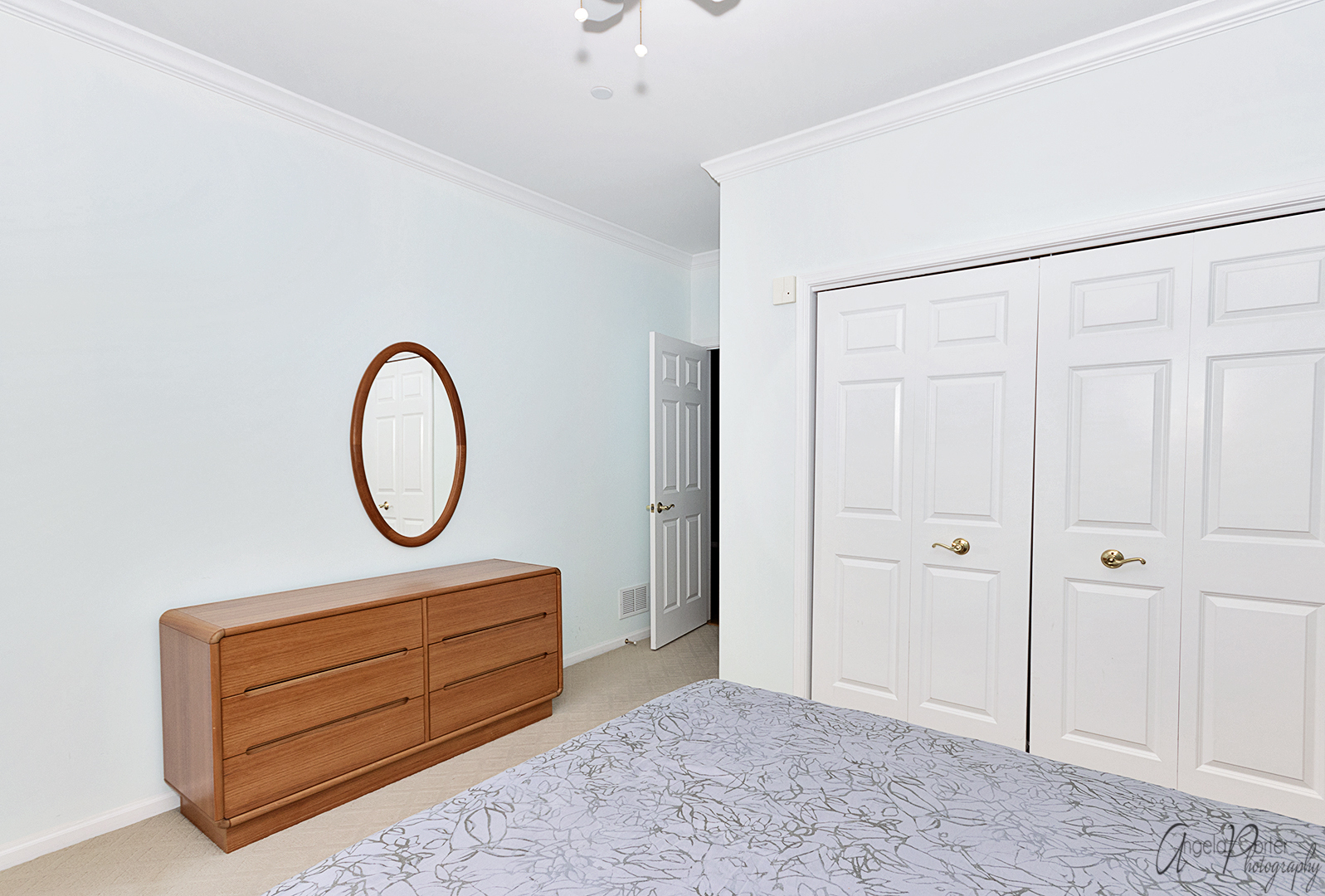640 McHenry Road, Unit 108 Wheeling, IL 60090 - Photo 7 of 30 a area with closet on the wall and a mirror