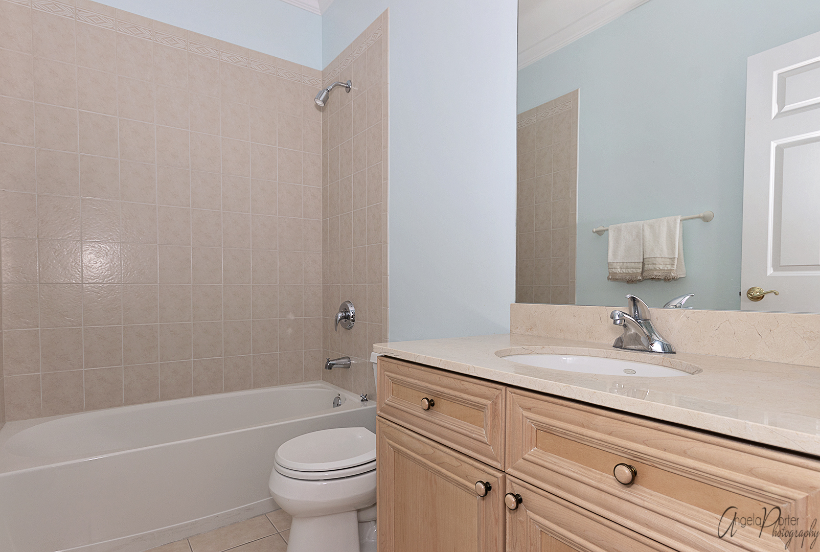 640 McHenry Road, Unit 108 Wheeling, IL 60090 - Photo 8 of 30 a bathroom with a sink a toilet and shower