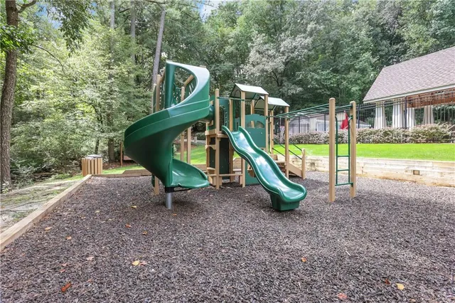 an aerial view of a house with a swimming pool